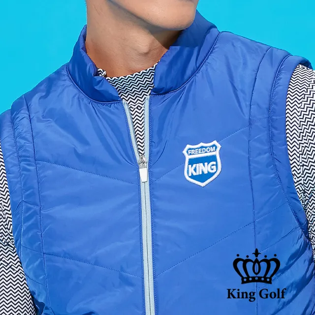 【KING GOLF】速達-盾牌繡花下擺彈性剪接素面中厚款防風背心外套(藍色)