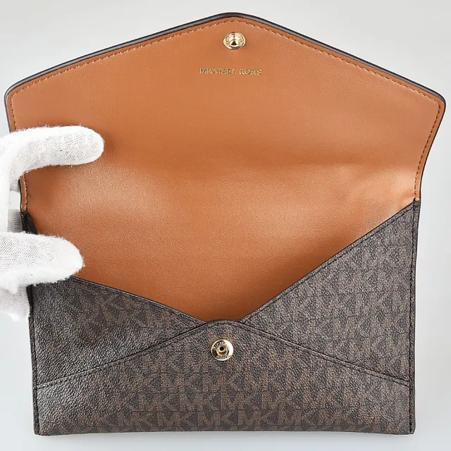 【Michael Kors】MICHAEL KORS JET SET CHARM金字LOGO印花PVC拼接牛皮三合一手拿包(深褐x棕)