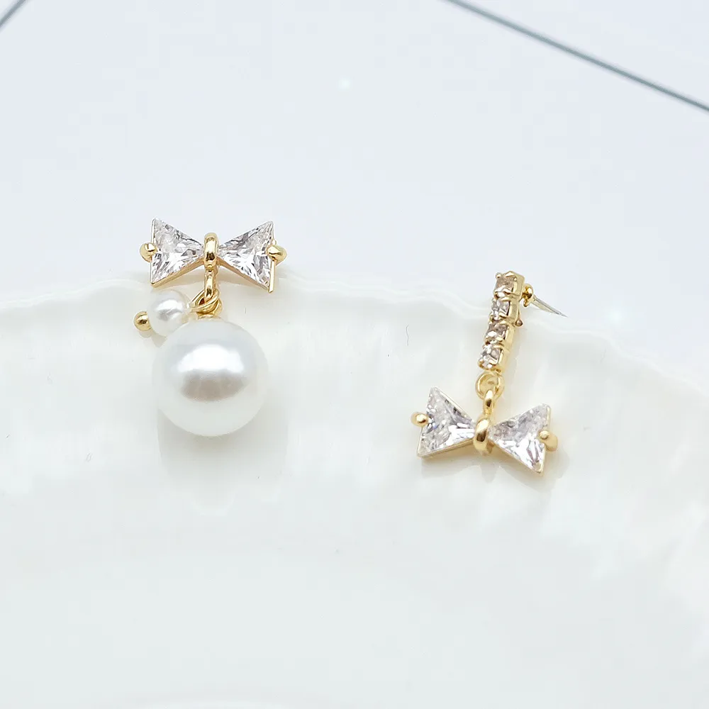 【Anpan】925銀針韓東大門簡約蝴蝶結珍珠水晶不對稱耳環