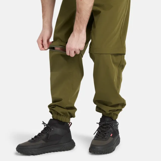 【Timberland】男款深橄欖色防潑水可拆卸式慢跑褲(A6THP302)