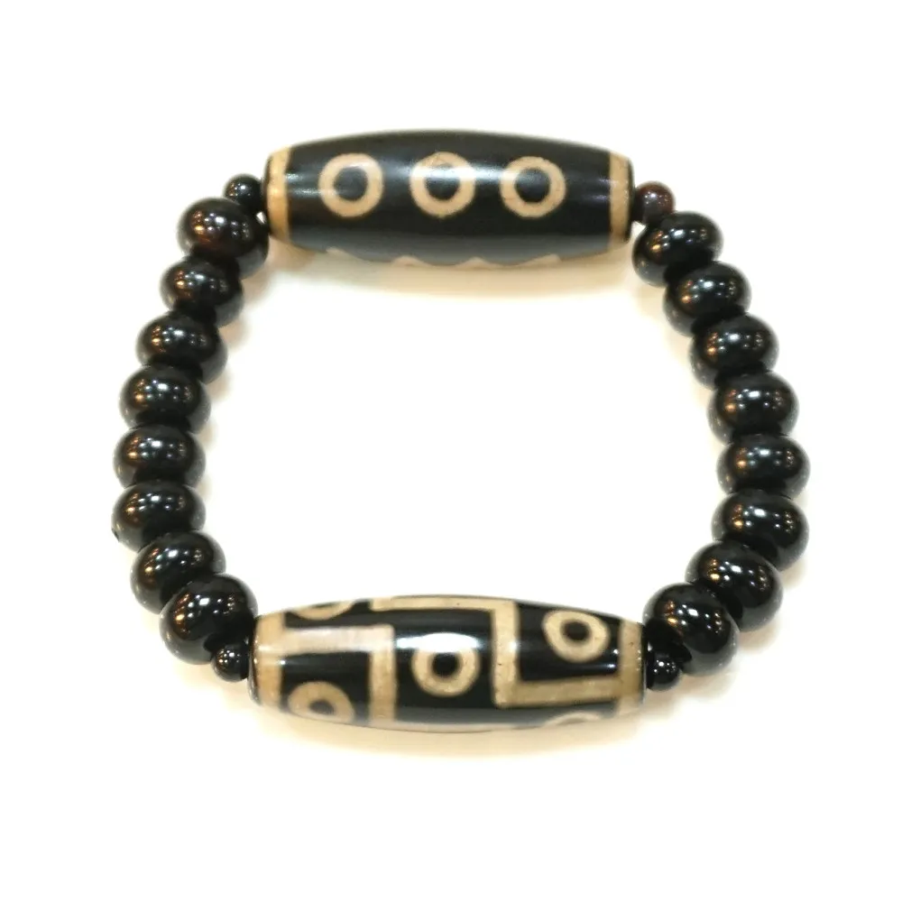 西蔵老礦至尊大型九眼天珠〔巾着付） 台湾経典黒老