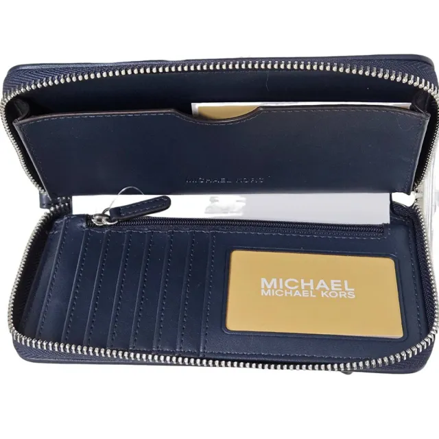 【Michael Kors】MK銀字LOGO牛仔8卡拉鍊手拿長夾(贈原廠紙袋紙盒送禮)