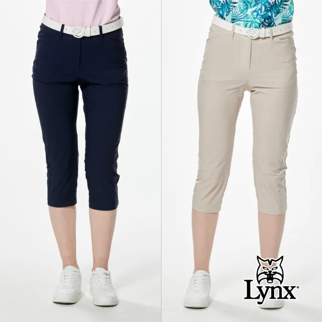 【Lynx Golf】女款彈性舒適後腰鬆緊帶設計經典山貓貓頭貼膜造型窄管七分褲(二色)