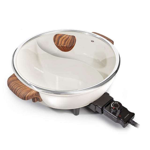 Wonder旺德 WH-K67 電火鍋，適合4人家庭使用，容量達5L，內鍋採用不粘塗層合金材質，易清潔不沾鍋。尺寸400x348x202mm，功率1100~1200W，110V/60Hz，中國製造，附專用插頭及1年保固，BSMI許可字號R3D198。白色系設計簡約實用，快速加熱煮湯煮麵一鍋搞定，提升廚房便利性，家用電火鍋首選！