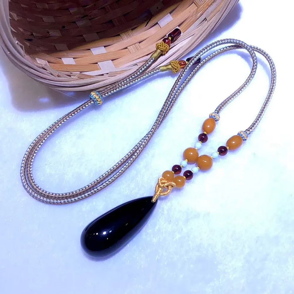 【勝弘珠寶】波羅的海淨水血珀立體水滴精編設計繩款項鍊