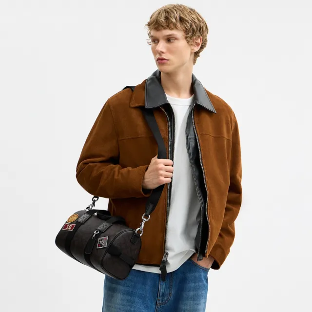 【COACH】蔻馳官方直營 EXPLORER 28 經典 SIGNATURE 貼飾行李袋 旅行袋 斜背包-SV/核桃棕色/黑色(CGA26)